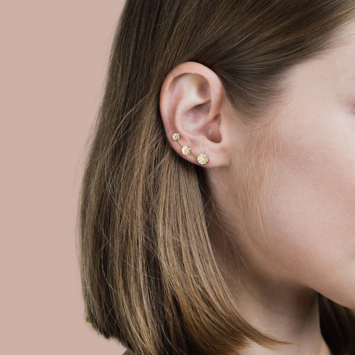 Kolczyk srebrny złocony - nausznica młotkowane koła